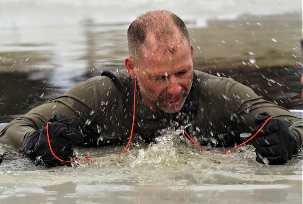 Cold-water immersion training by CWOC students at Fort McCoy