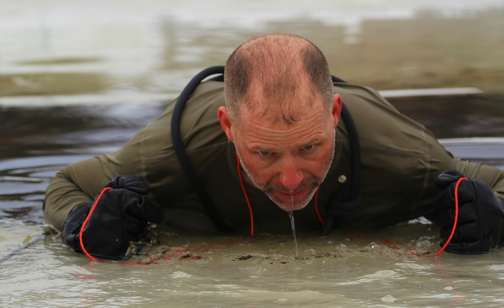 Cold-water immersion training by CWOC students at Fort McCoy