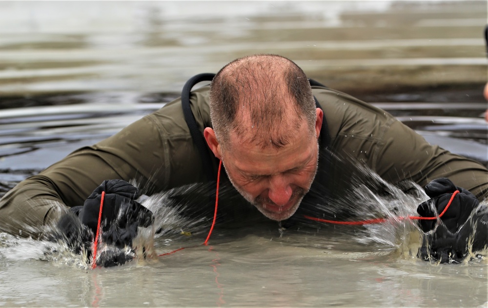 Cold-water immersion training by CWOC students at Fort McCoy