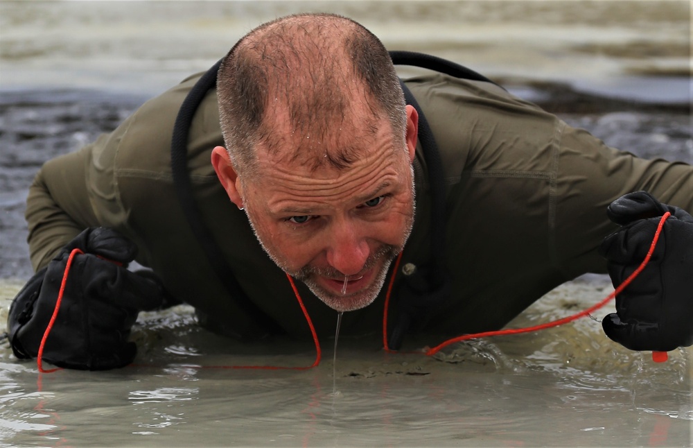 Cold-water immersion training by CWOC students at Fort McCoy