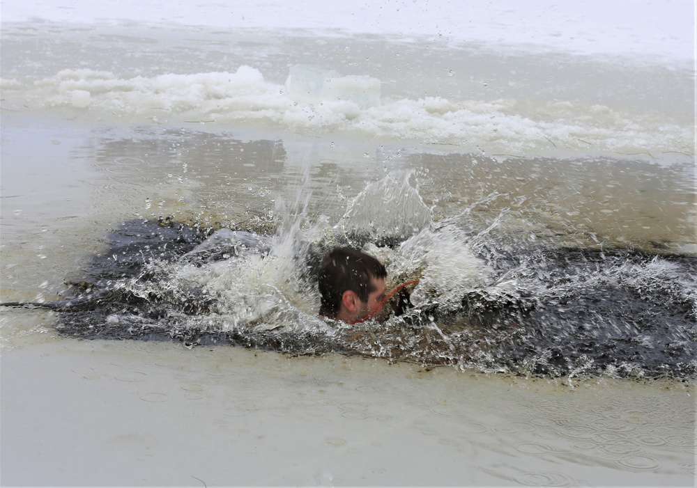 Cold-water immersion training by CWOC students at Fort McCoy