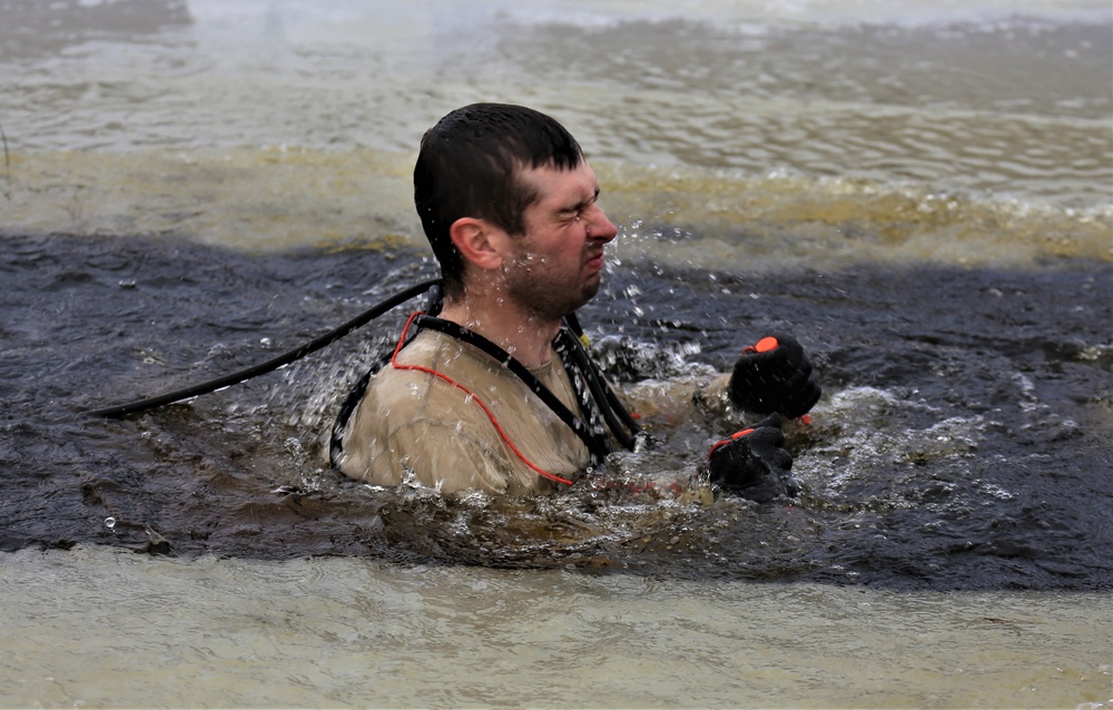 Cold-water immersion training by CWOC students at Fort McCoy