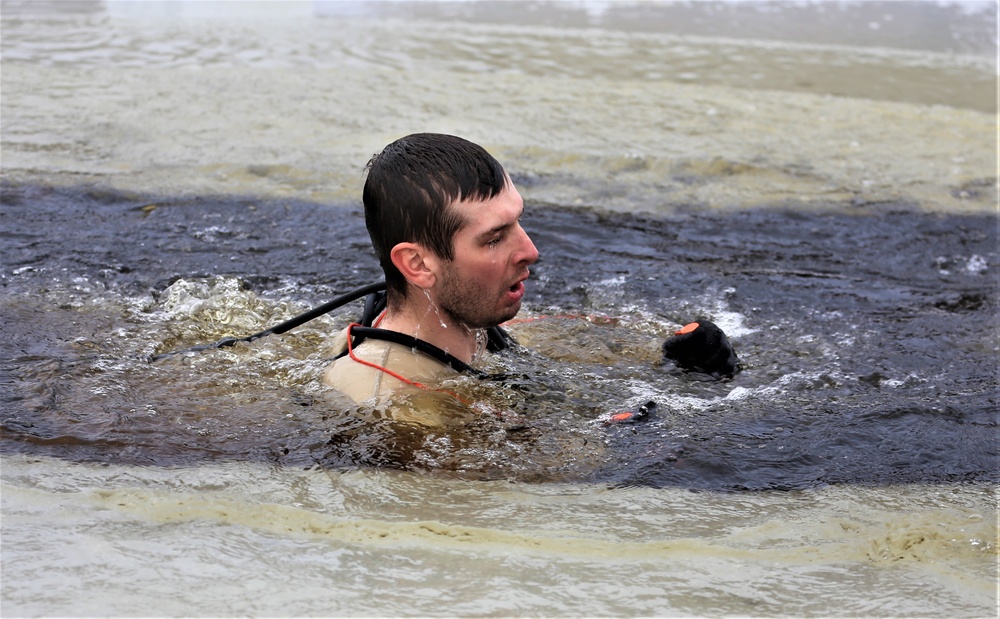 Cold-water immersion training by CWOC students at Fort McCoy