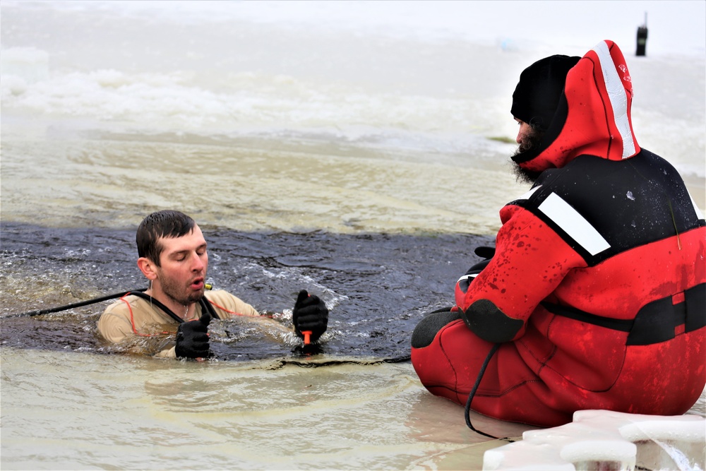 Cold-water immersion training by CWOC students at Fort McCoy