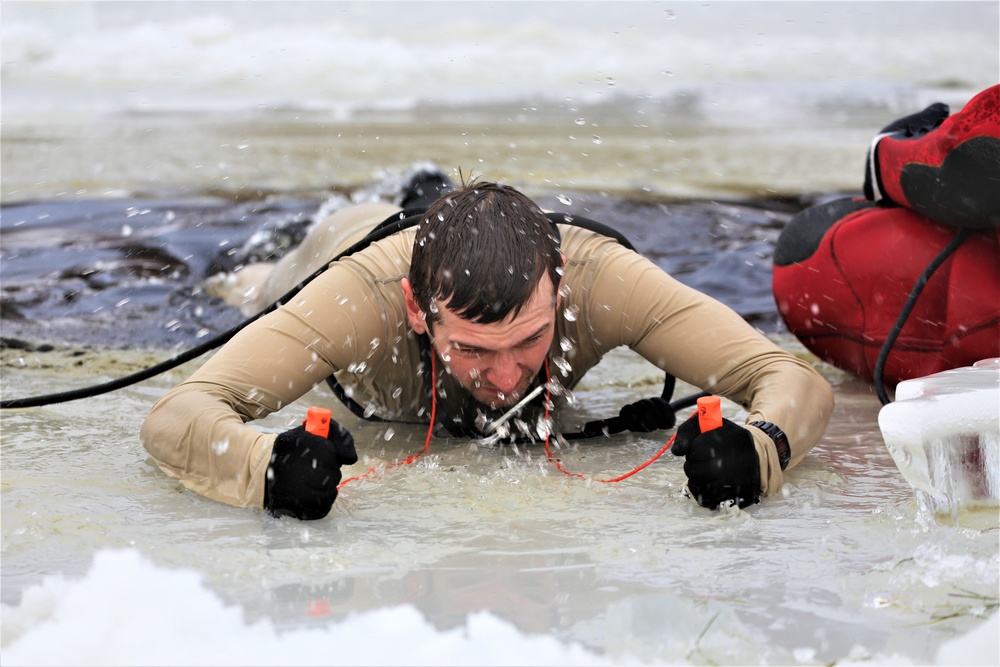 Cold-water immersion training by CWOC students at Fort McCoy