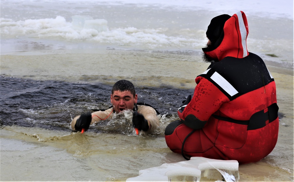 Cold-water immersion training by CWOC students at Fort McCoy