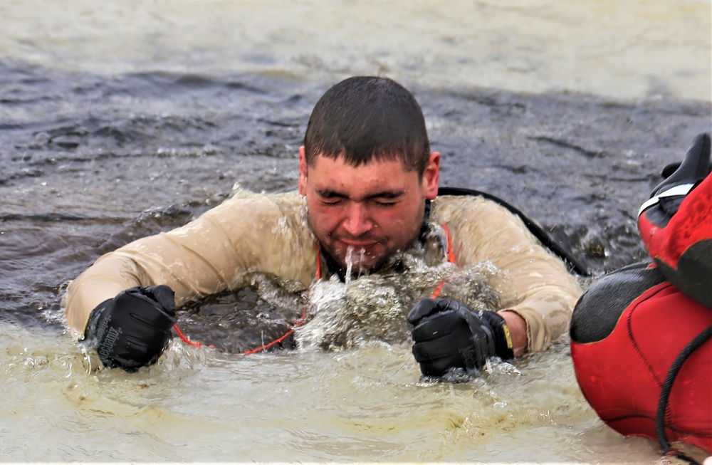 Cold-water immersion training by CWOC students at Fort McCoy