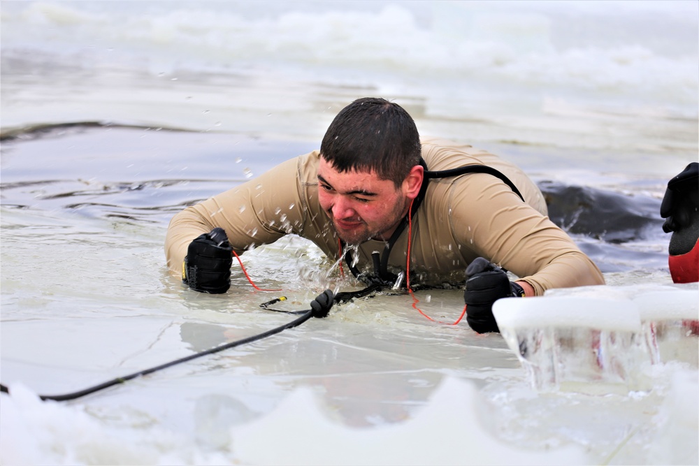 Cold-water immersion training by CWOC students at Fort McCoy