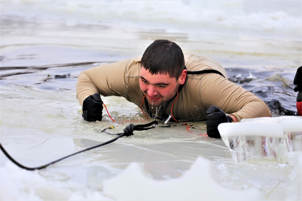 Cold-water immersion training by CWOC students at Fort McCoy