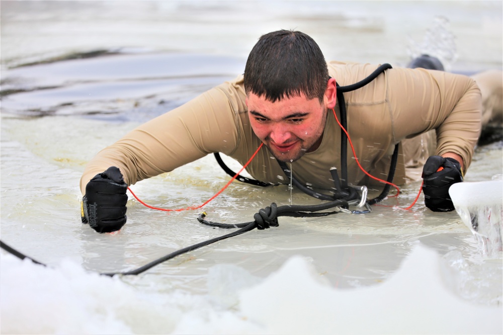 Cold-water immersion training by CWOC students at Fort McCoy