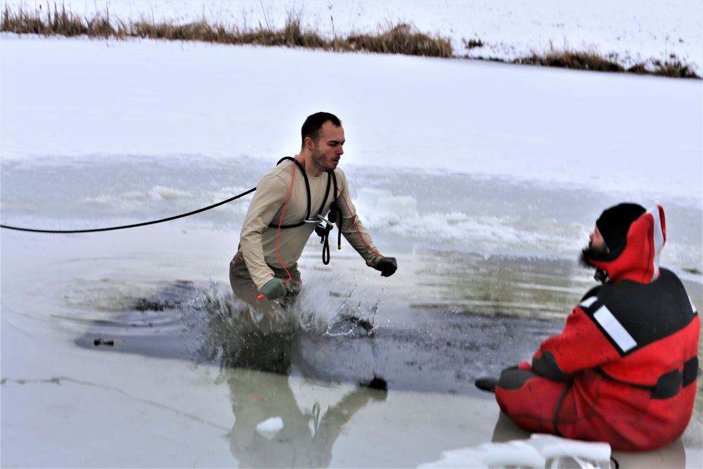 Cold-water immersion training by CWOC students at Fort McCoy