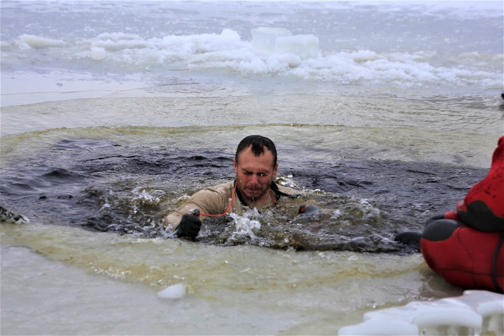 Cold-water immersion training by CWOC students at Fort McCoy