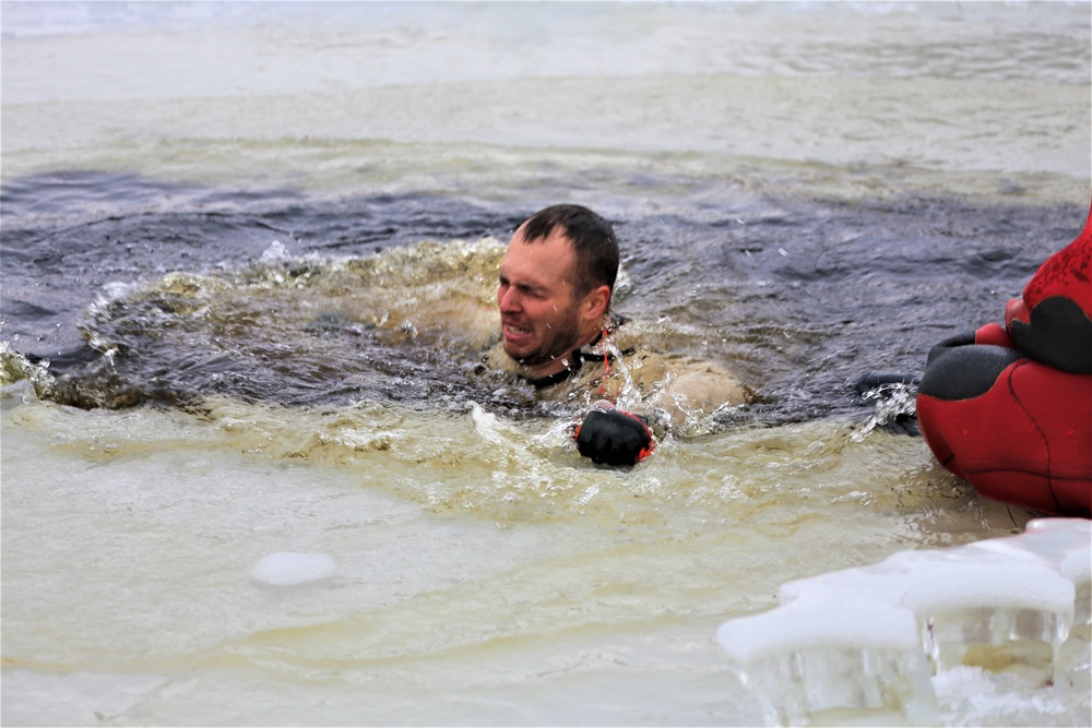 Cold-water immersion training by CWOC students at Fort McCoy