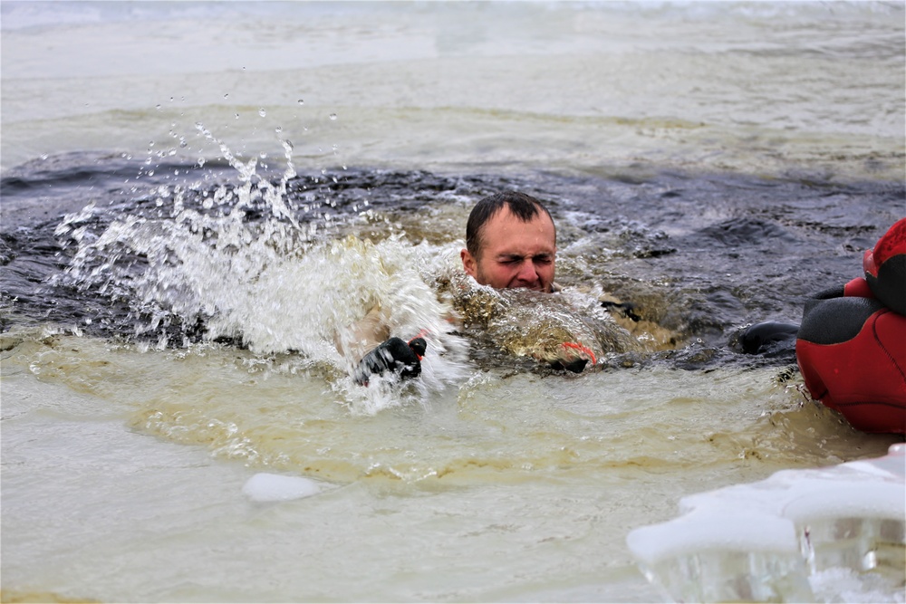 Cold-water immersion training by CWOC students at Fort McCoy