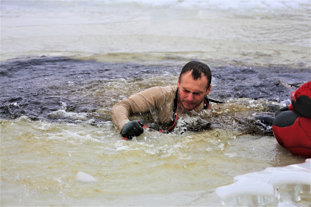 Cold-water immersion training by CWOC students at Fort McCoy