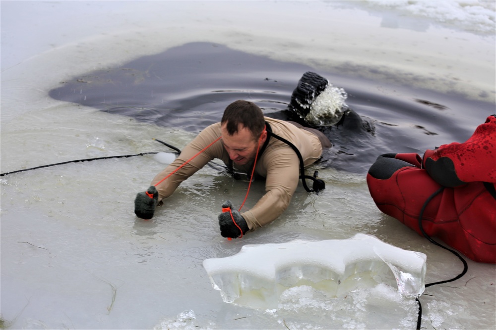 Cold-water immersion training by CWOC students at Fort McCoy