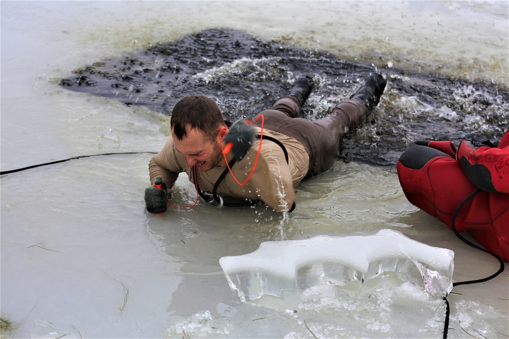 Cold-water immersion training by CWOC students at Fort McCoy