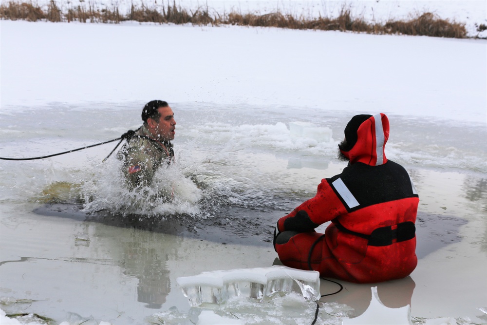 Cold-water immersion training by CWOC students at Fort McCoy