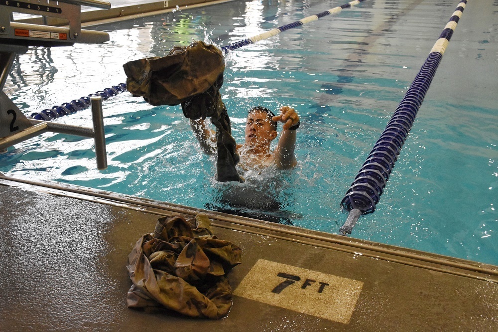 100 meter swim in uniform