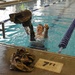 100 meter swim in uniform