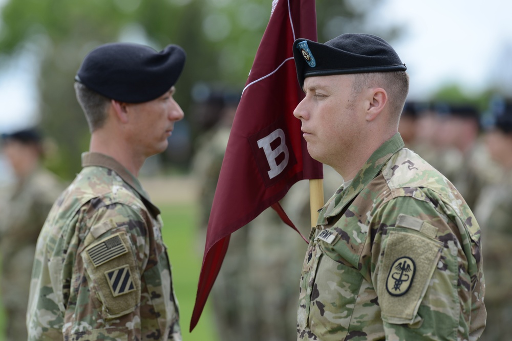 Bearing the guidon