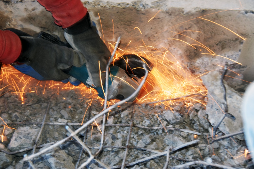 USACE Black Rock Lock employee excavates concrete