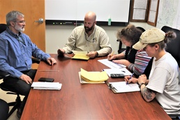 Fort McCoy Forestry team reviews timber sale bids