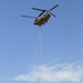 Chinook ferries helicopter to maintenance facility