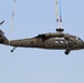 Chinook ferries helicopter to maintenance facility