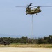 Chinook ferries helicopter to maintenance facility