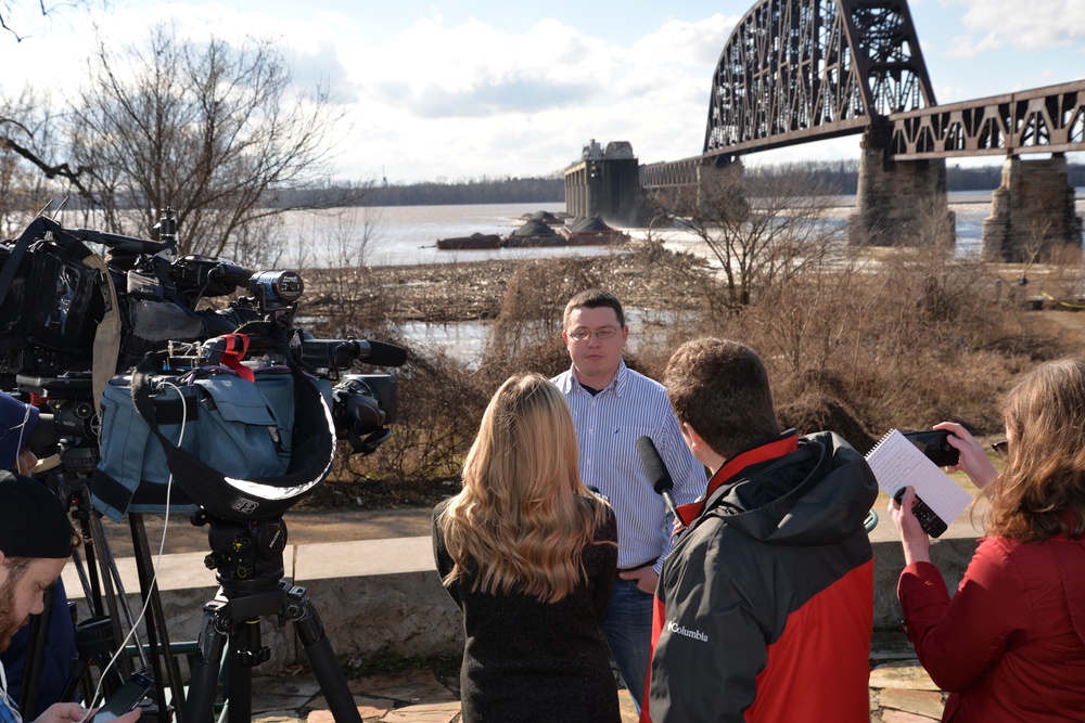 Barges pinned against McAlpine Dam on Ohio River