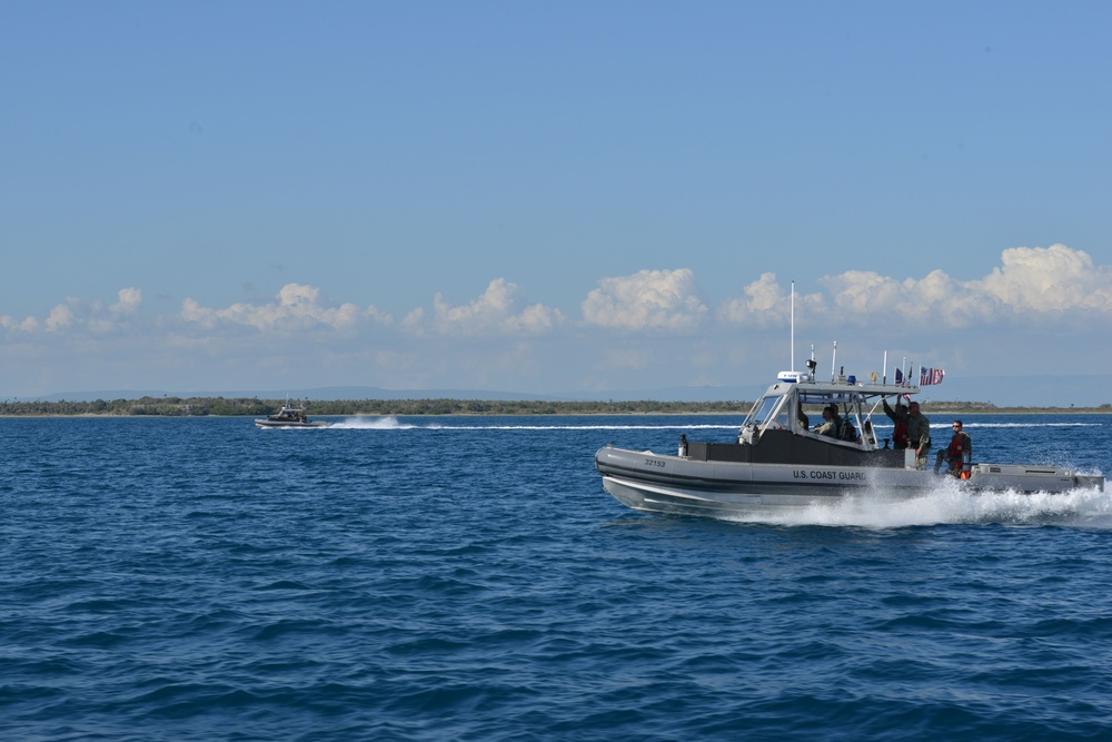 Coast Guard Pacific Area Commander and staff visit Port Security Unit 311 service members deployed to Guantanamo Bay, Cuba