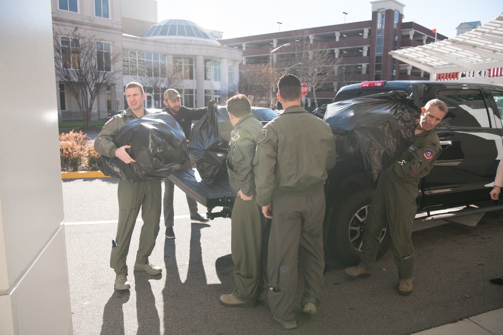 149th Fighter Squadron partners with community to donate toys to Children's Hospital