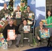 149th Fighter Squadron partners with community to donate toys to Children's Hospital