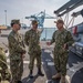 U.S. Navy Rear Adm. Paul J. Schlise, right, deputy commander of U.S. Naval Forces Central Command and U.S. 5th Fleet,