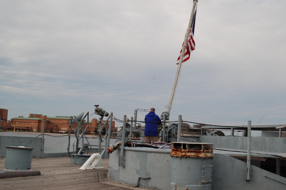 Raising the National Ensign on a Battleship