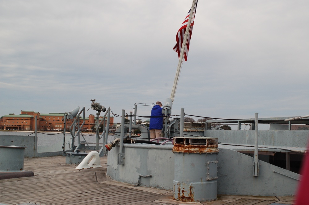 Raising the National Ensign aboard a Battleship