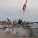 Raising the National Ensign aboard a Battleship