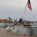 Raising the National Ensign aboard a Battleship