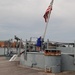 Raising the National Ensign aboard a Battleship