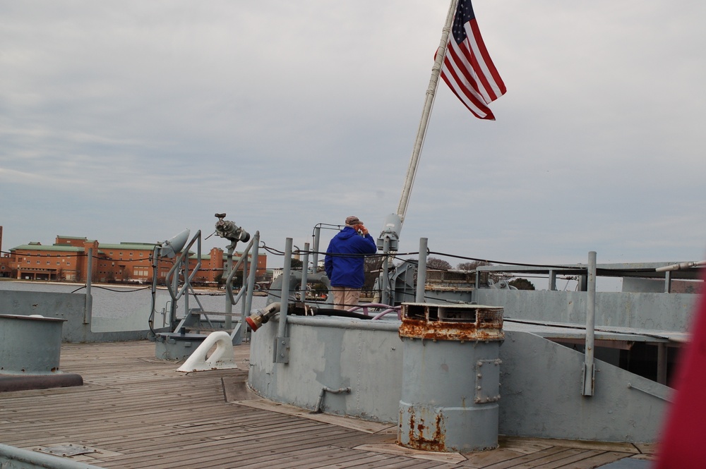 Raising the National Ensign aboard a Battleship