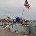 Raising the National Ensign aboard a Battleship