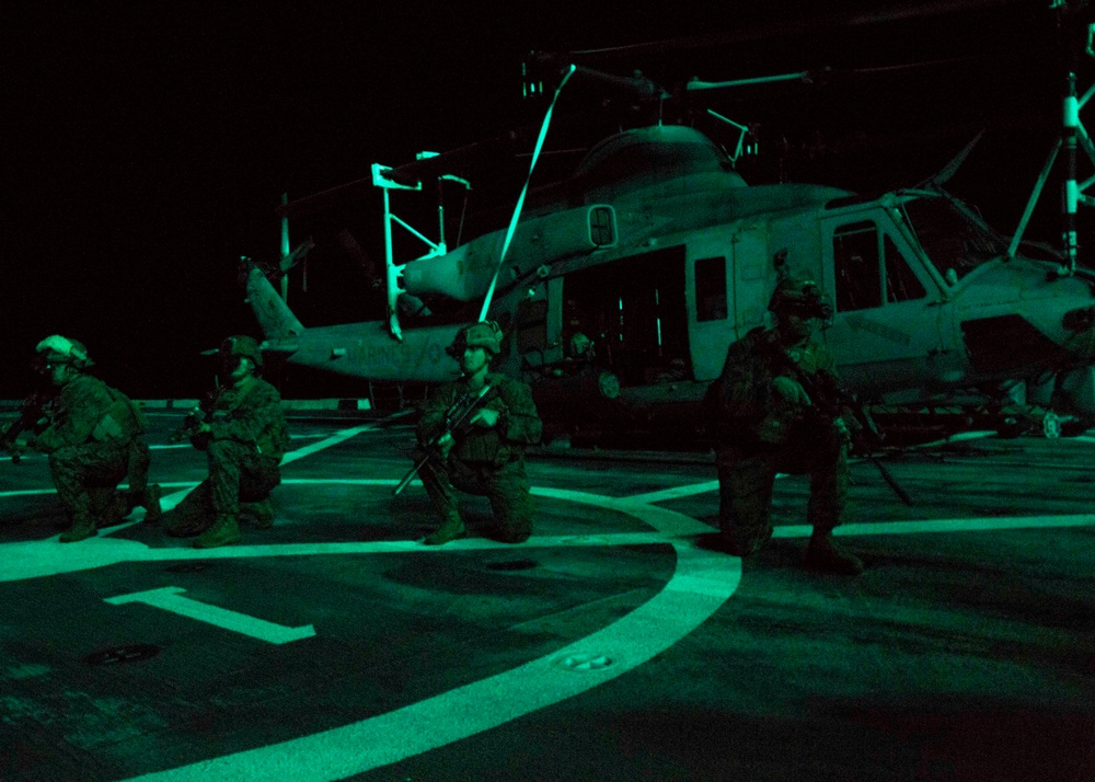 Huey disembarkation drills at night on the USS Arlington