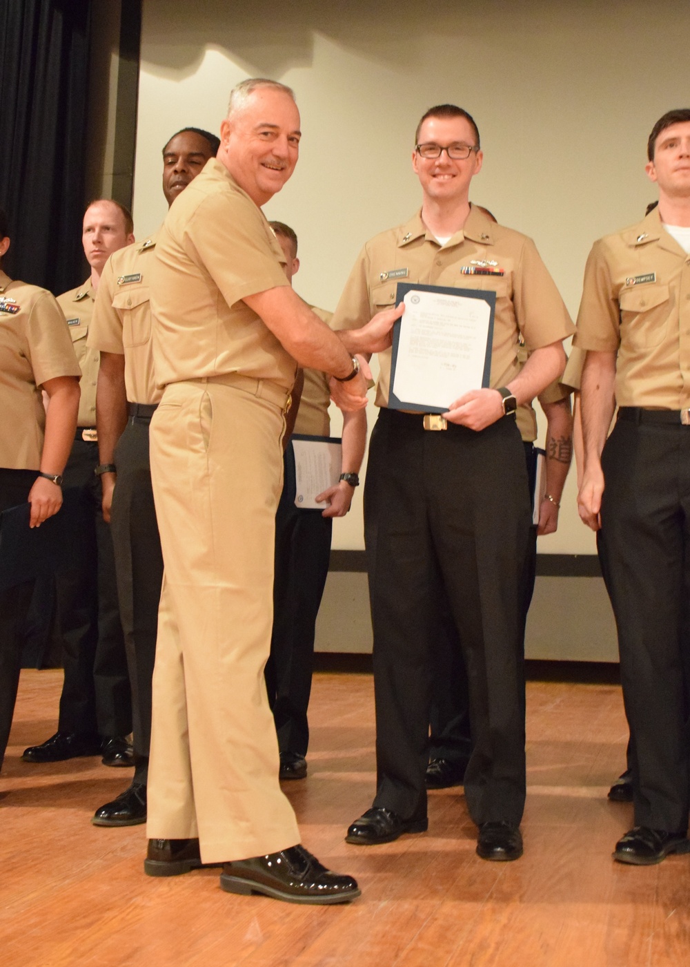 Cryptologic Technician (Networks) 1st Class Nicholas Drenning receives his promotion frocking letter