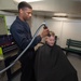 U.S. Sailor cuts commanding officer's hair