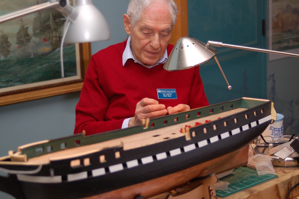 Model shipbuilder at Naval Museum