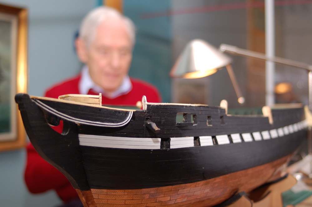 Model shipbuilder at Naval Museum