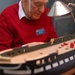 Model shipbuilder at Naval Museum