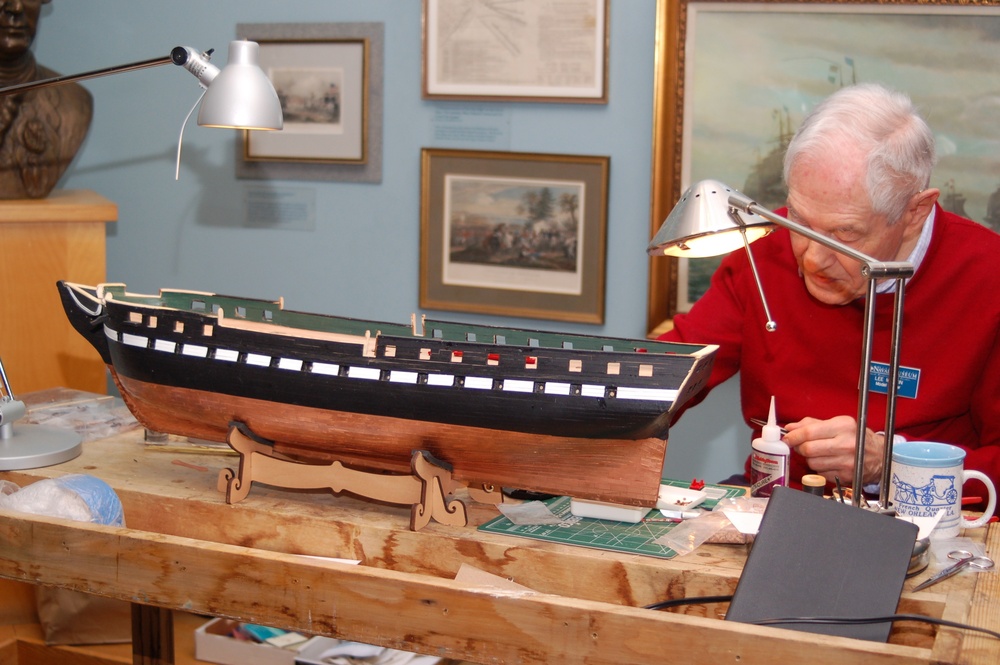 Model shipbuilder at Naval Museum