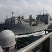 USNS Charles Drew transits alongside USS John C. Stennis during a replenishment-at-sea